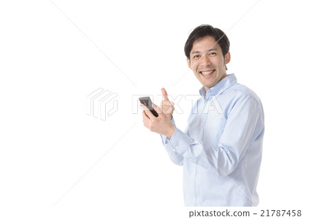 A man operating a smartphone 21787458