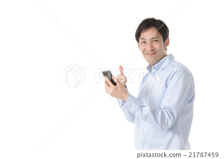 A man operating a smartphone A man operating a smartphone 21787459