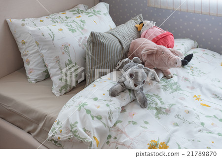 kid's bedroom with dolls on bed kid's bedroom with dolls on bed 21789870