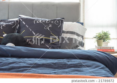 modern bedroom with black pillows on bed modern bedroom with black pillows on bed 21789872