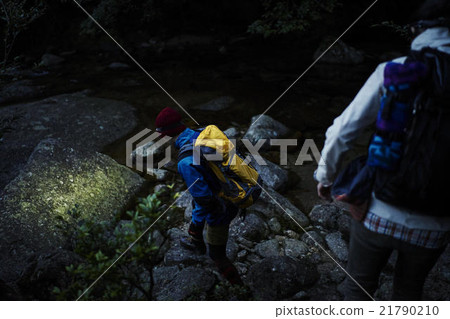 Men walking in mountains Men walking in mountains 21790210