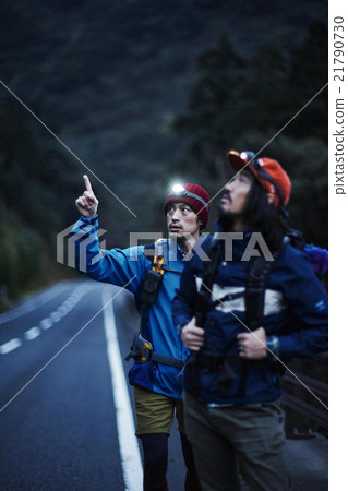 Men walking in mountains Men walking in mountains 21790730