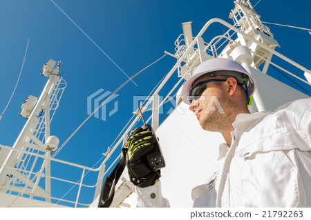 Deck officer speaking by VHF on deck 21792263