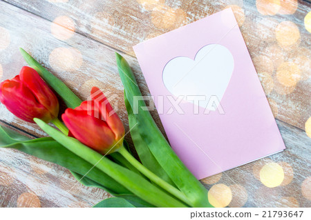 close up of tulips and greeting card with heart close up of tulips and greeting card with heart 21793647