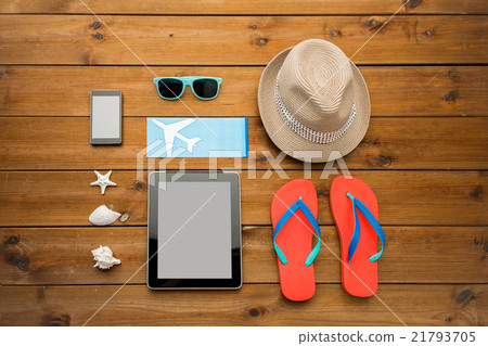 close up of tablet pc and travel stuff 21793705