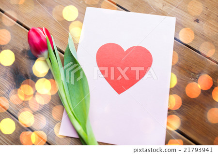 close up of flowers and greeting card with heart close up of flowers and greeting card with heart 21793941