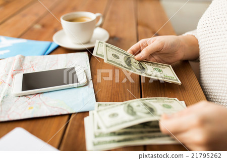 close up of traveler hands counting dollar money close up of traveler hands counting dollar money 21795262