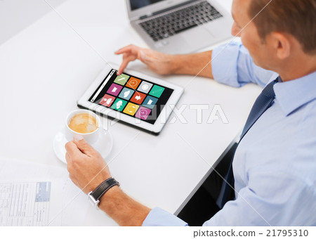businessman with app icons on tablet pc and coffee businessman with app icons on tablet pc and coffee 21795310