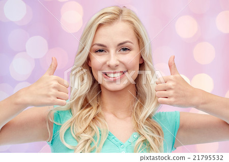 happy woman or teenage girl showing thumbs up happy woman or teenage girl showing thumbs up 21795532