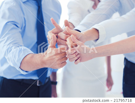 business team showing thumbs up in office business team showing thumbs up in office 21795718