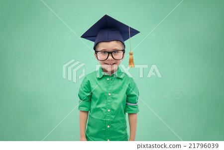 happy boy in bachelor hat or mortarboard 21796039