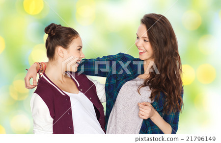 happy smiling pretty teenage girls hugging happy smiling pretty teenage girls hugging 21796149