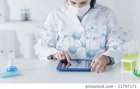 close up of scientist with tablet pc in laboratory close up of scientist with tablet pc in laboratory 21797171