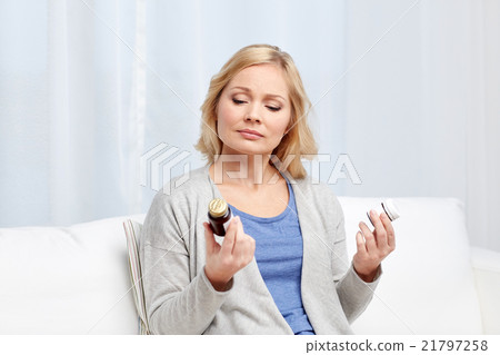 woman with medicine jars at home woman with medicine jars at home 21797258