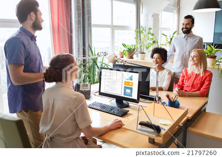 happy creative team talking in office happy creative team talking in office 21797260