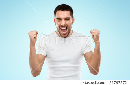young man celebrating victory blue gray young man celebrating victory blue gray 21797272