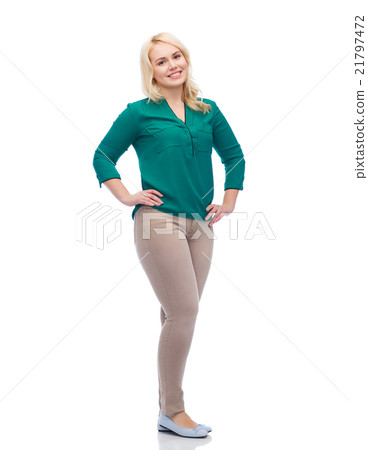 smiling young woman in shirt and trousers smiling young woman in shirt and trousers 21797472
