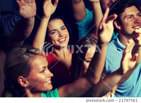 smiling friends at concert in club 21797561