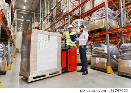 worker on forklift and businessman at warehouse worker on forklift and businessman at warehouse 21797603