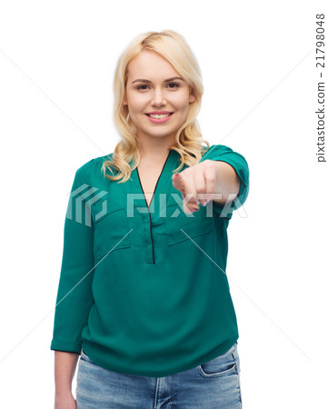 smiling young woman pointing finger on you smiling young woman pointing finger on you 21798048