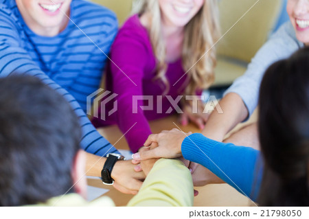 group of high school students with hand on top group of high school students with hand on top 21798050