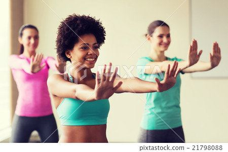 group of smiling people dancing in gym or studio group of smiling people dancing in gym or studio 21798088