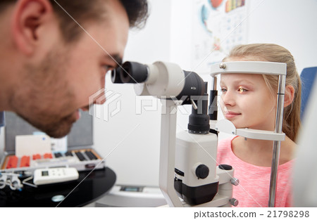 optician with tonometer and patient at eye clinic 21798298