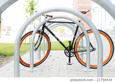 close up of fixed gear bicycle at street parking close up of fixed gear bicycle at street parking 21798434