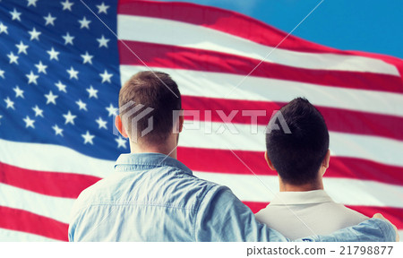 close up of happy male gay couple hugging 21798877