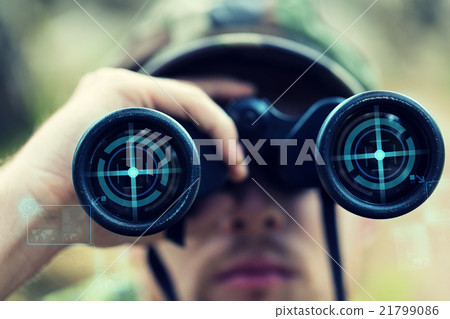 close up of soldier or hunter with binocular close up of soldier or hunter with binocular 21799086