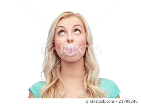 happy young woman or teenage girl chewing gum happy young woman or teenage girl chewing gum 21799246