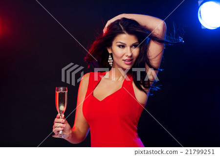 beautiful woman with champagne glass at nightclub beautiful woman with champagne glass at nightclub 21799251