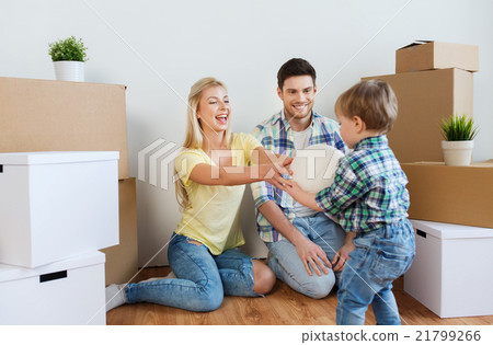 happy family moving to new home and playing ball happy family moving to new home and playing ball 21799266