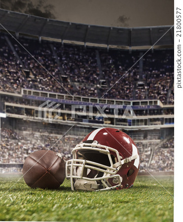 The ball of american football players and helmet 21800577