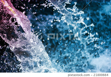 close up water drops in a blurred background color 21800664