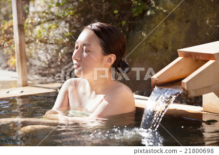 Middle women relaxing in hot spring hot spring bath 21800698