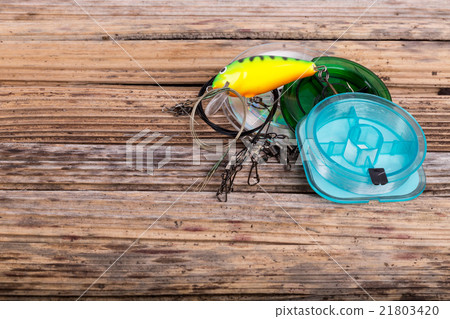 fishing tackles on background of dry stems fishing tackles on background of dry stems 21803420