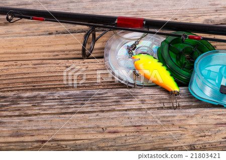 fishing tackles on background of dry stems fishing tackles on background of dry stems 21803421