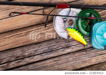 fishing tackles on background of dry stems fishing tackles on background of dry stems 21803422