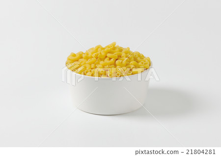 Bowl of dried macaroni 21804281