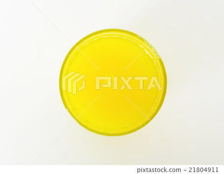 Glass of lemon-flavored drink 21804911