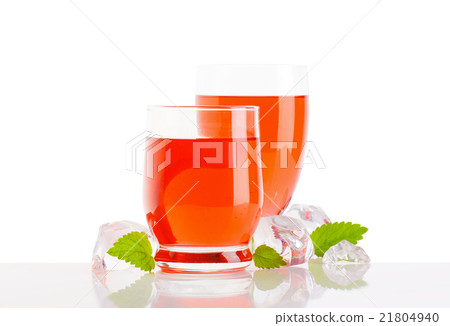 Glasses of fruit flavored drinks 21804940