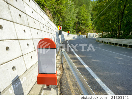 kilometer stone post on the roadside in Romania kilometer stone post on the roadside in Romania 21805141