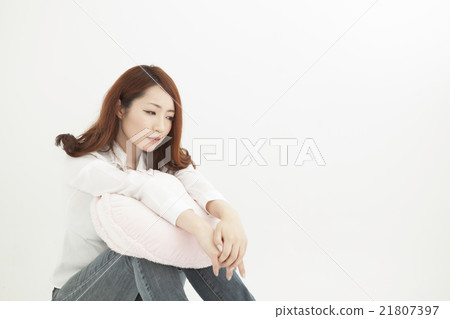 Lonely, depressed woman white back 21807397