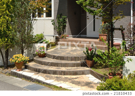 A residential area approach surrounded by greenery A residential area approach surrounded by greenery 21810433