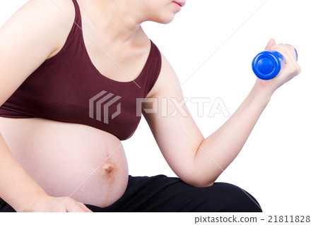 Pregnant woman exercising with dumbbell 21811828