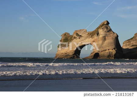 Unique rock formation at Wharariki Beach 21813167