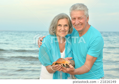 elderly couple rest at tropical resort elderly couple rest at tropical resort 21816149