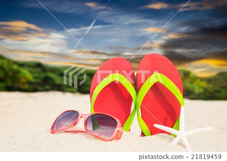 Colorful sandals on beach 21819459