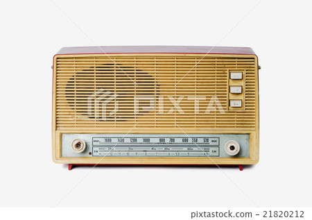 Old dusty radio from 1970 on white background Old dusty radio from 1970 on white background 21820212